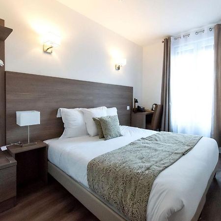 Le Theatre Hotel Suresnes Buitenkant foto