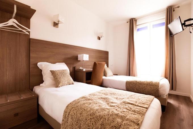 Le Theatre Hotel Suresnes Buitenkant foto